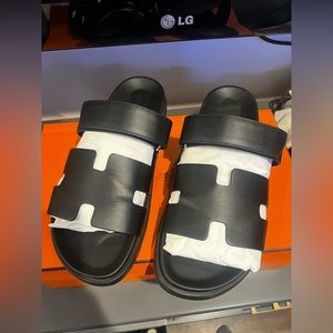 Hermes Black leather Chypre slides